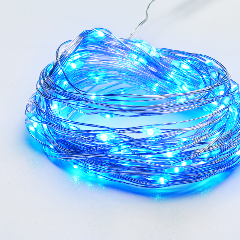 X01100612 100 сини LED струнни светлини, сребрист меден кабел, адаптер 3,5 VDC, 8 функции, IP44, 10 м + 3 м - Image 1